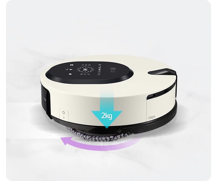 로봇 청소기가 바닥에 놓여 있으며, 상단에는 다양한 아이콘과 함께 LG 로고가 보입니다. 기기 측면에 Objet라는 글자가 있습니다. 청소기 아래쪽에 2kg의 압력이 가해지고 있음을 나타내는 파란색 화살표와 회전을 나타내는 보라색 화살표가 있습니다. 